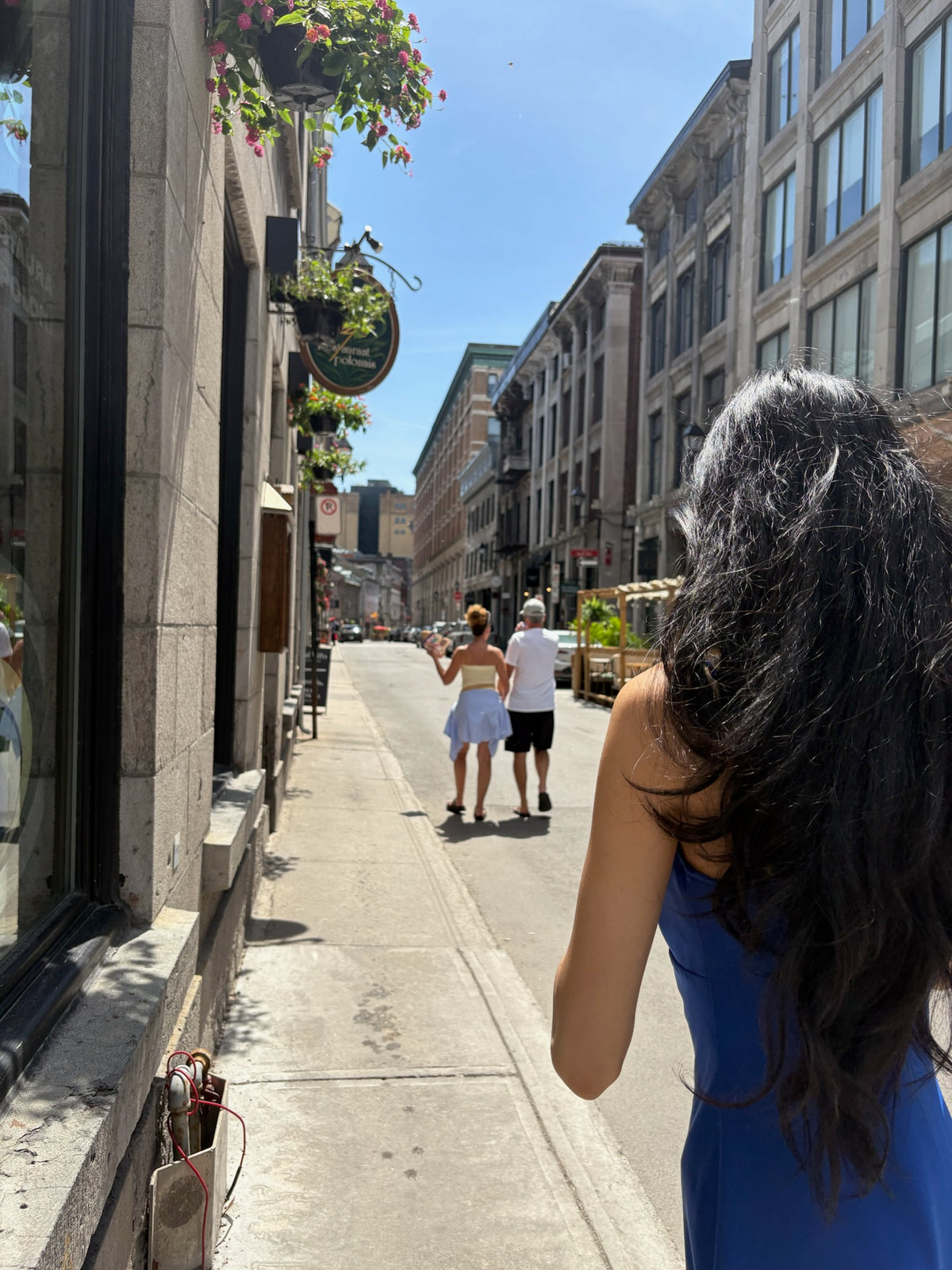 The founder with a Maison Carthia bottle in Old Montréal
